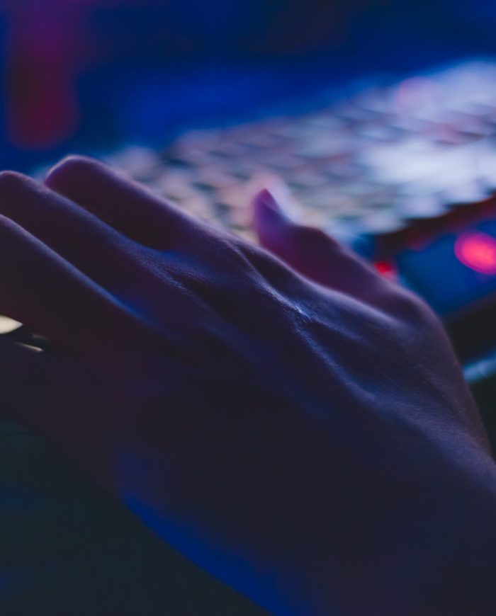 photo of person typing on computer keyboard
